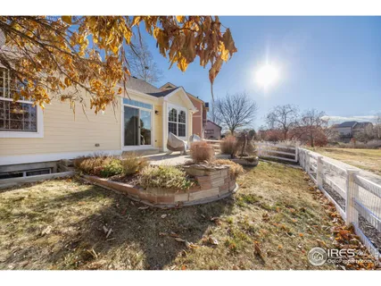 a house with swimming pool in front of it