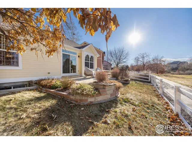 a house with swimming pool in front of it
