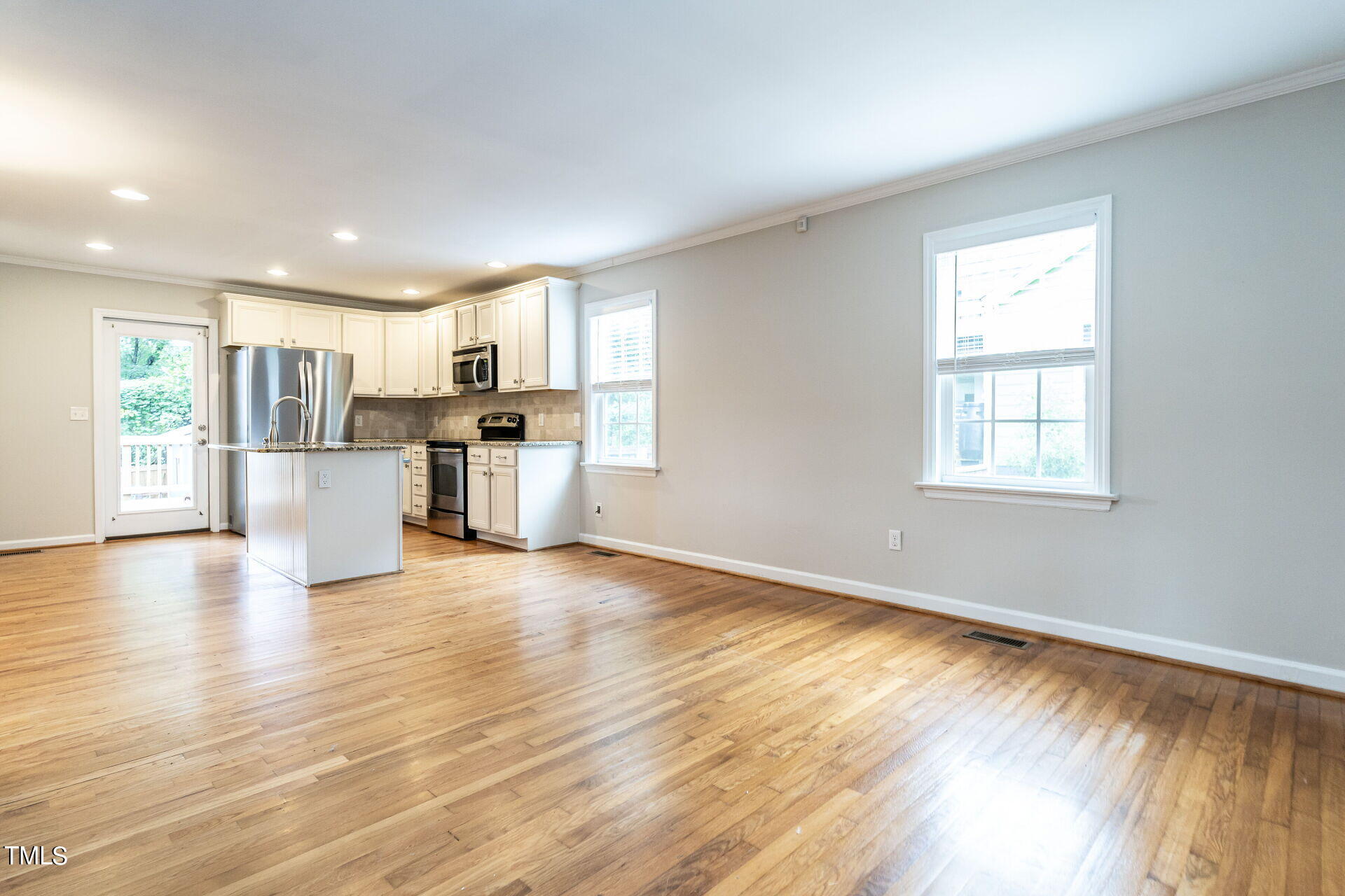116 Plainview Avenue Raleigh, NC 27604 - Photo 12 of 35 a view of a kitchen with a sink and a window