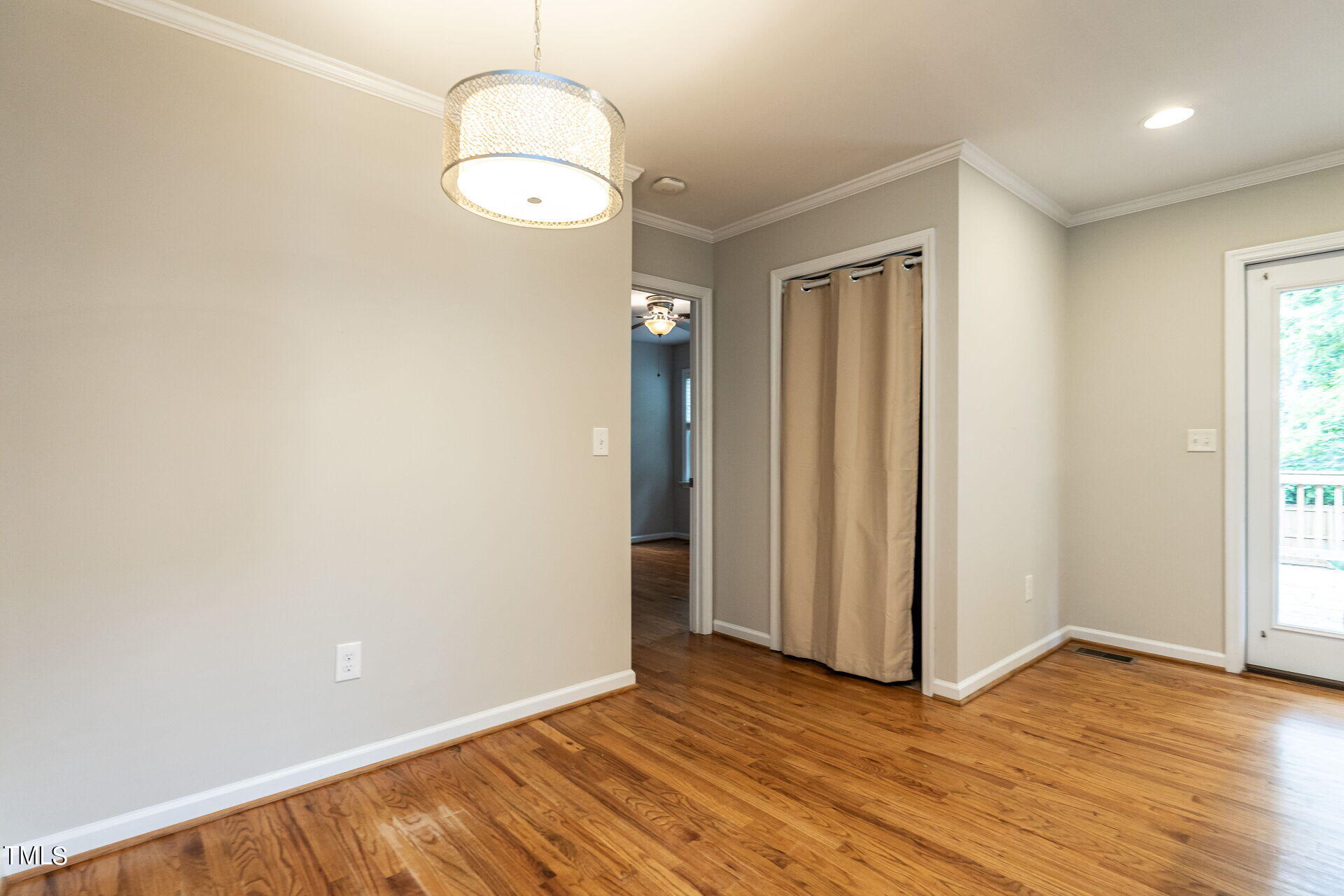 116 Plainview Avenue Raleigh, NC 27604 - Photo 20 of 35 an empty room with wooden floor and windows