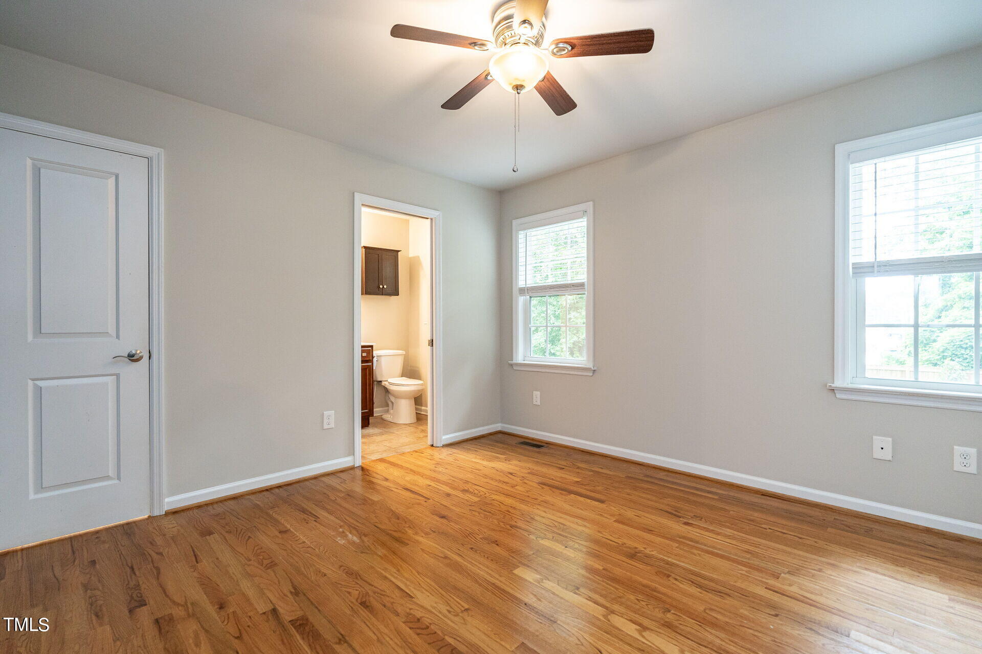 116 Plainview Avenue Raleigh, NC 27604 - Photo 23 of 35 wooden floor in an empty room with a window
