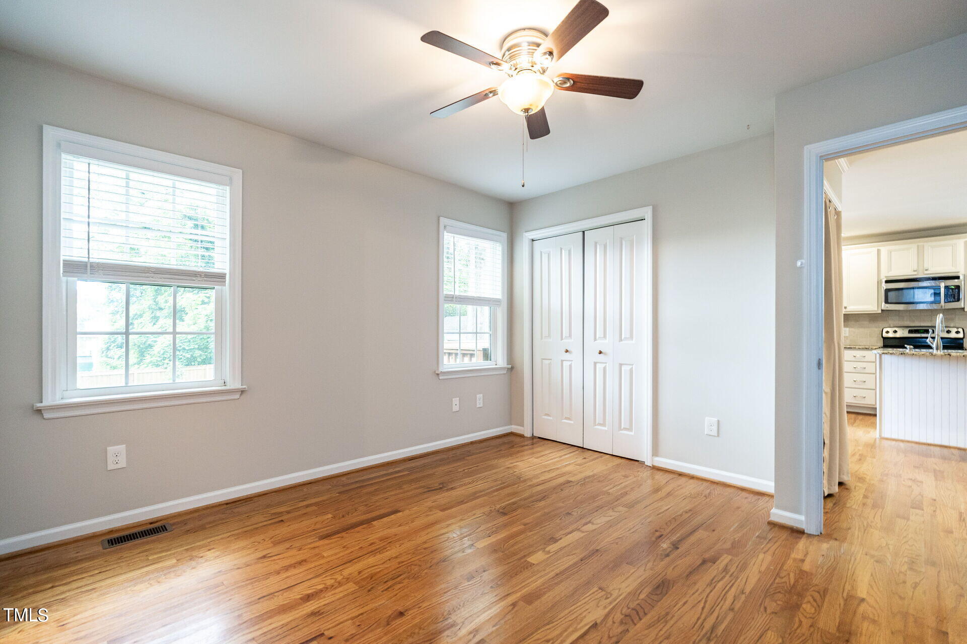 116 Plainview Avenue Raleigh, NC 27604 - Photo 24 of 35 wooden floor in an empty room with a window