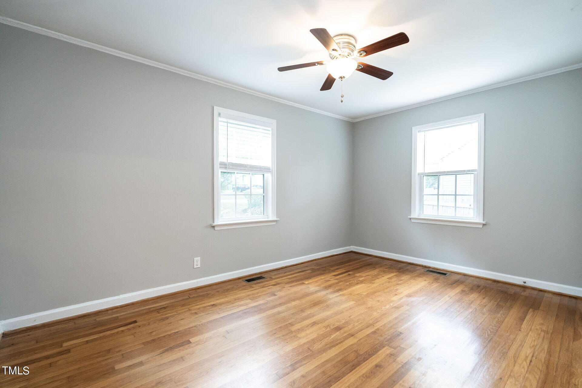 116 Plainview Avenue Raleigh, NC 27604 - Photo 25 of 35 wooden floor in an empty room with a window