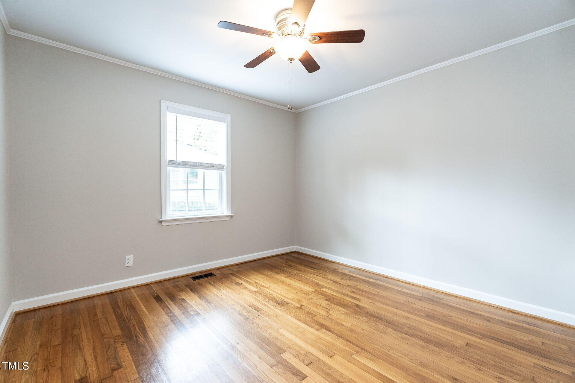 116 Plainview Avenue Raleigh, NC 27604 - Photo 27 of 35 wooden floor in an empty room with a window
