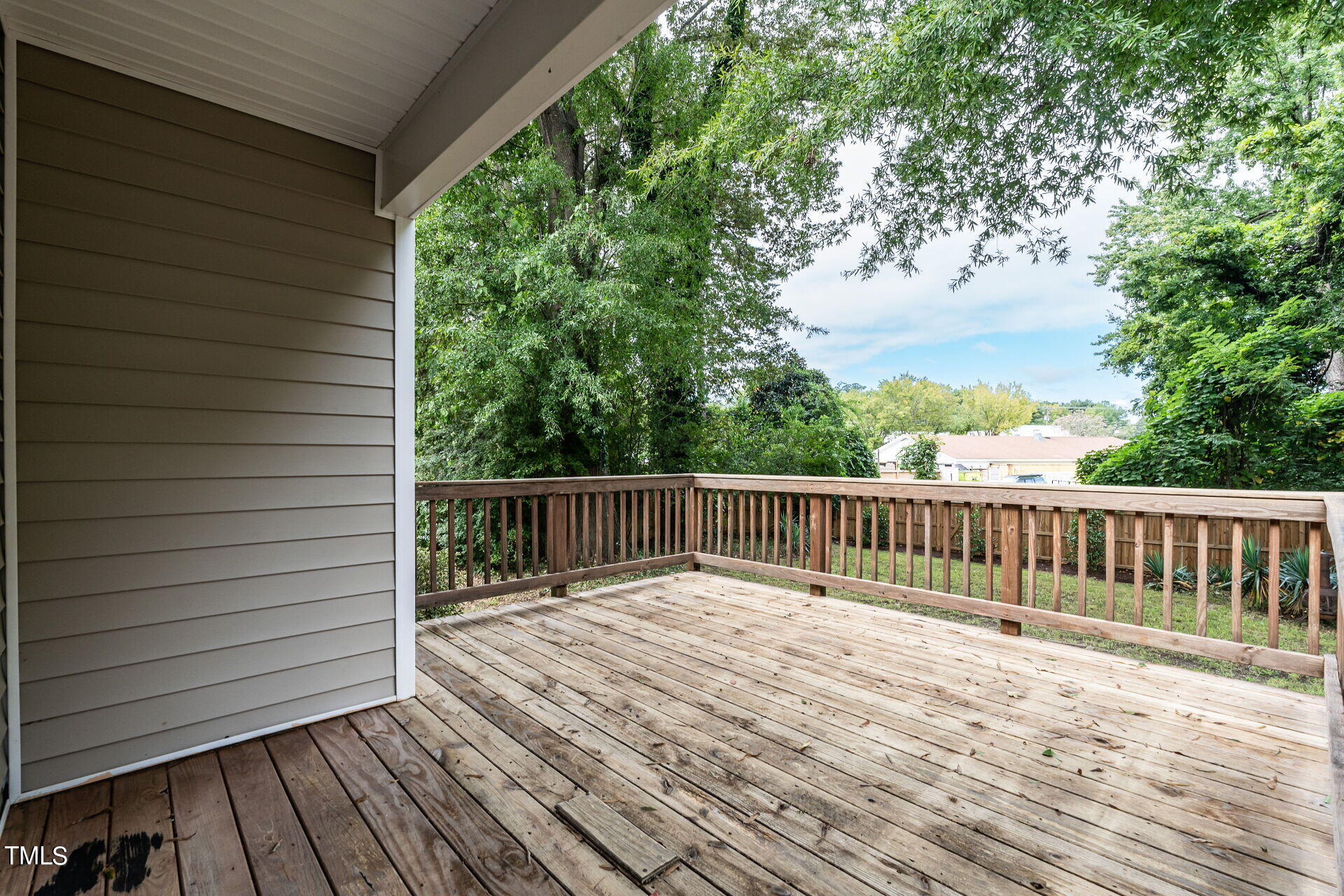 116 Plainview Avenue Raleigh, NC 27604 - Photo 28 of 35 a view of balcony with wooden floor and fence