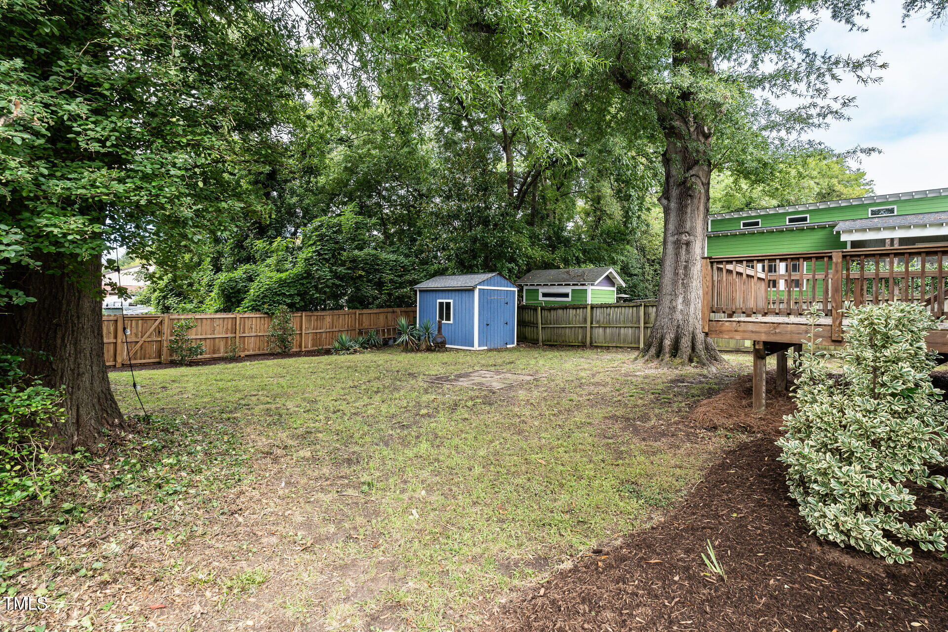116 Plainview Avenue Raleigh, NC 27604 - Photo 32 of 35 a backyard of a house with a swing and tree