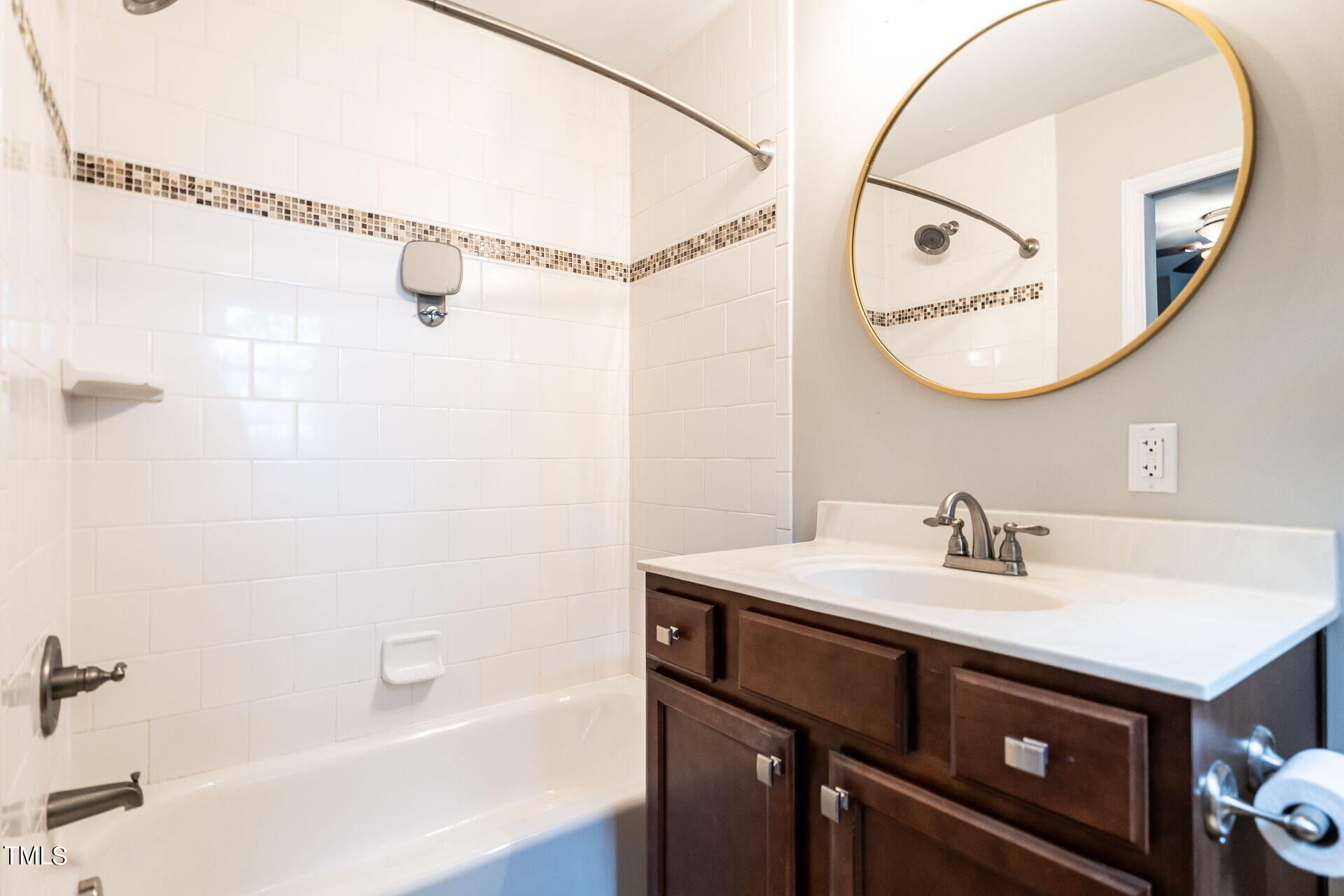 116 Plainview Avenue Raleigh, NC 27604 - Photo 5 of 35 a bathroom with a sink and a mirror