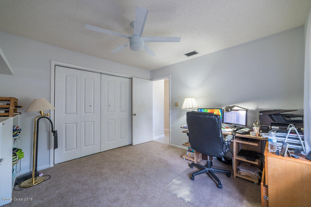 700 Montclair Road Northeast Palm Bay, FL 32905 - Photo 20 of 46 a view of a workspace with furniture