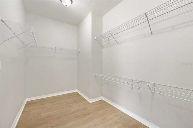 a view of a room with racks on the wall
