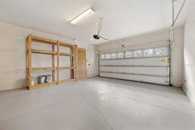 a view empty room with cabinet and mirrors