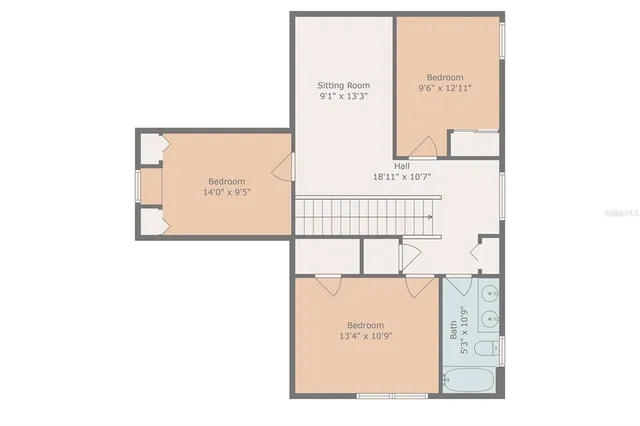 a picture of a bench in front of a wall