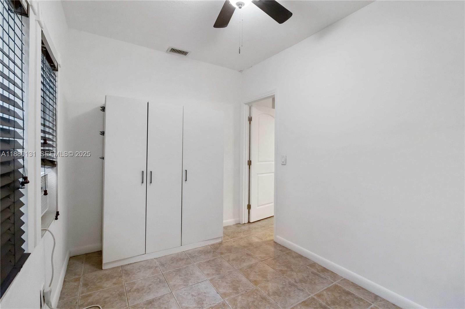 5740 Lincoln Street Hollywood, FL 33021 - Photo 16 of 28 wooden floor in an empty room