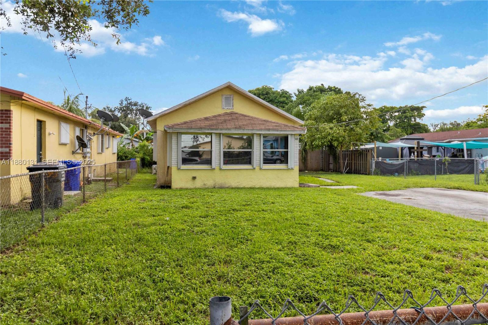 5740 Lincoln Street Hollywood, FL 33021 - Photo 28 of 28 a view of a house with a backyard