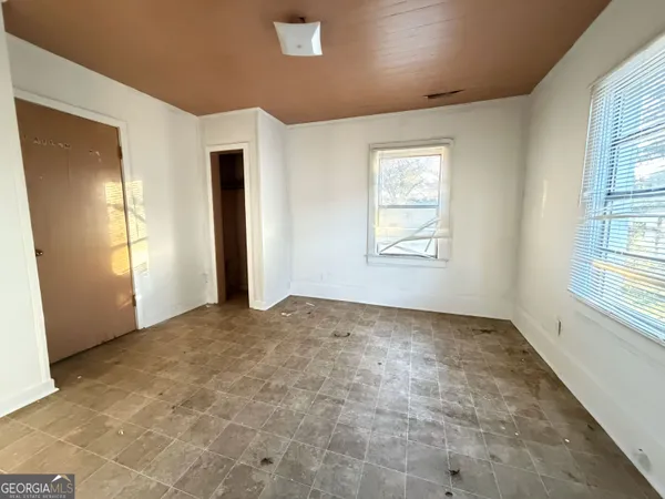 an empty room with windows