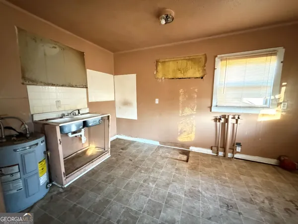 a view of a kitchen with a sink