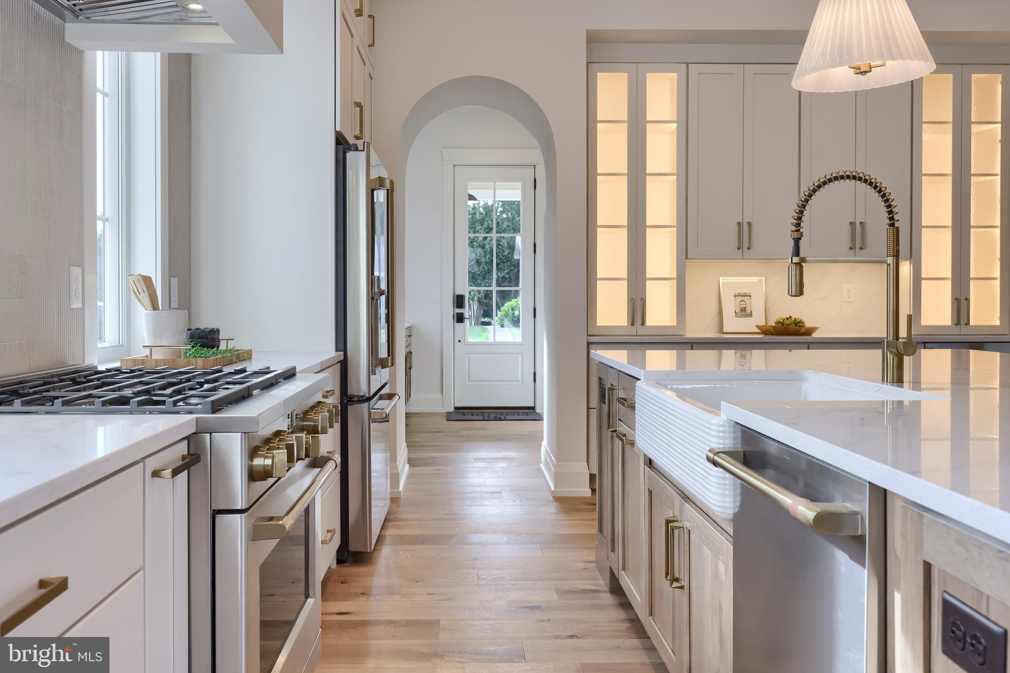1225 Hunsicker Road Lancaster, PA 17601 - Photo 15 of 41 a kitchen with stainless steel appliances granite countertop a stove top oven a sink a counter space and cabinets