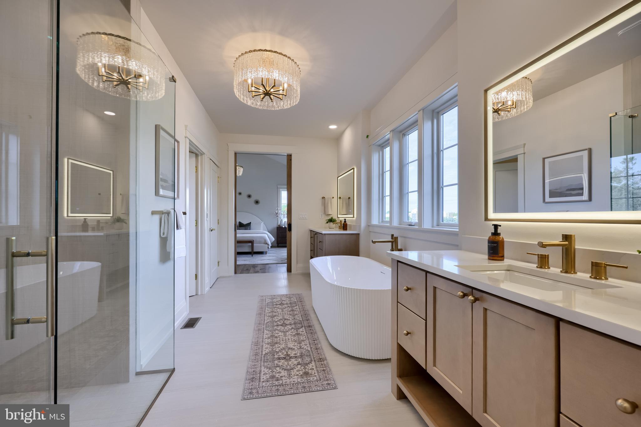 1225 Hunsicker Road Lancaster, PA 17601 - Photo 32 of 41 a spacious bathroom with a sink a large mirror and a shower
