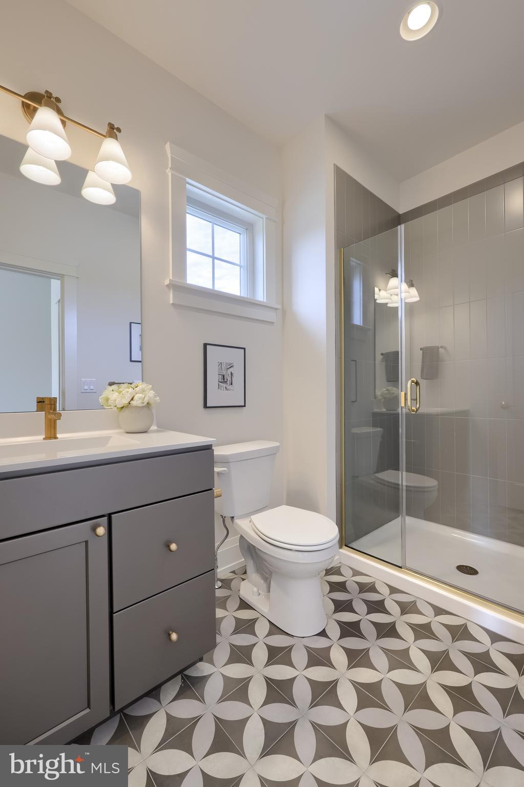 1225 Hunsicker Road Lancaster, PA 17601 - Photo 37 of 41 a bathroom with a sink a toilet and shower