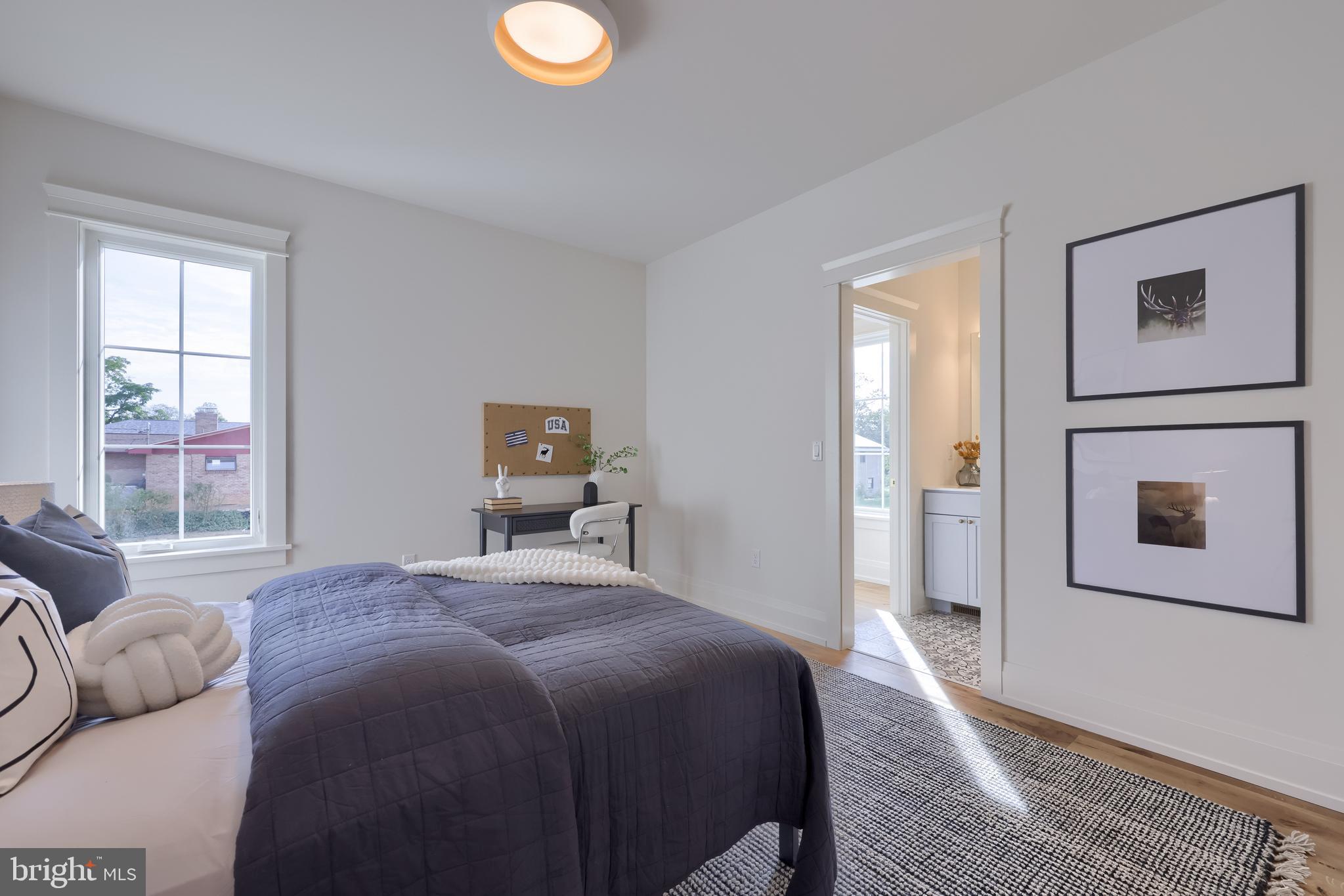 1225 Hunsicker Road Lancaster, PA 17601 - Photo 39 of 41 a bedroom with a bed wooden floor and window