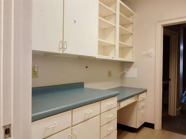 a room with window and a table