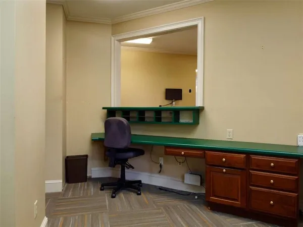 a room with a table and a window