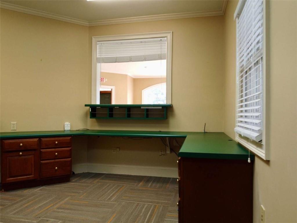 3218 Mill Street Northeast Covington, GA 30014 - Photo 28 of 69 a room with window and a table