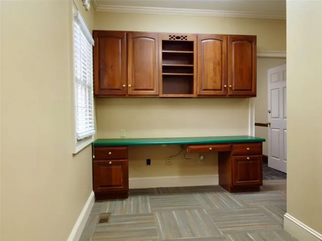 a room with window and a table