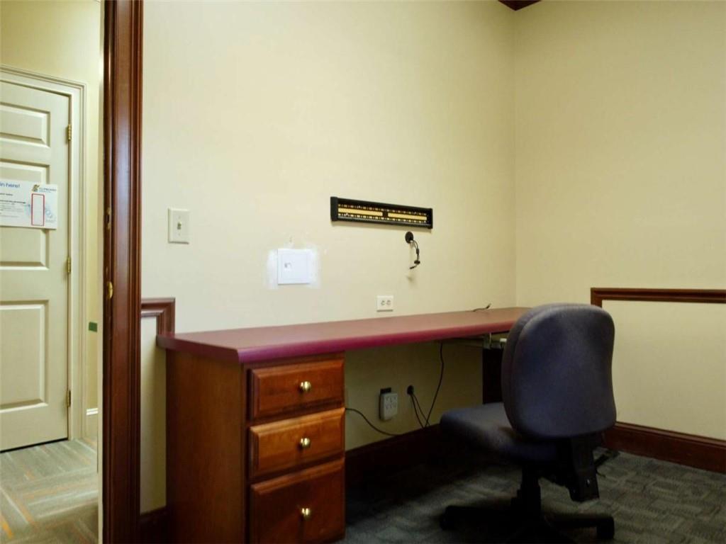 3218 Mill Street Northeast Covington, GA 30014 - Photo 30 of 69 a room with a desk and chair