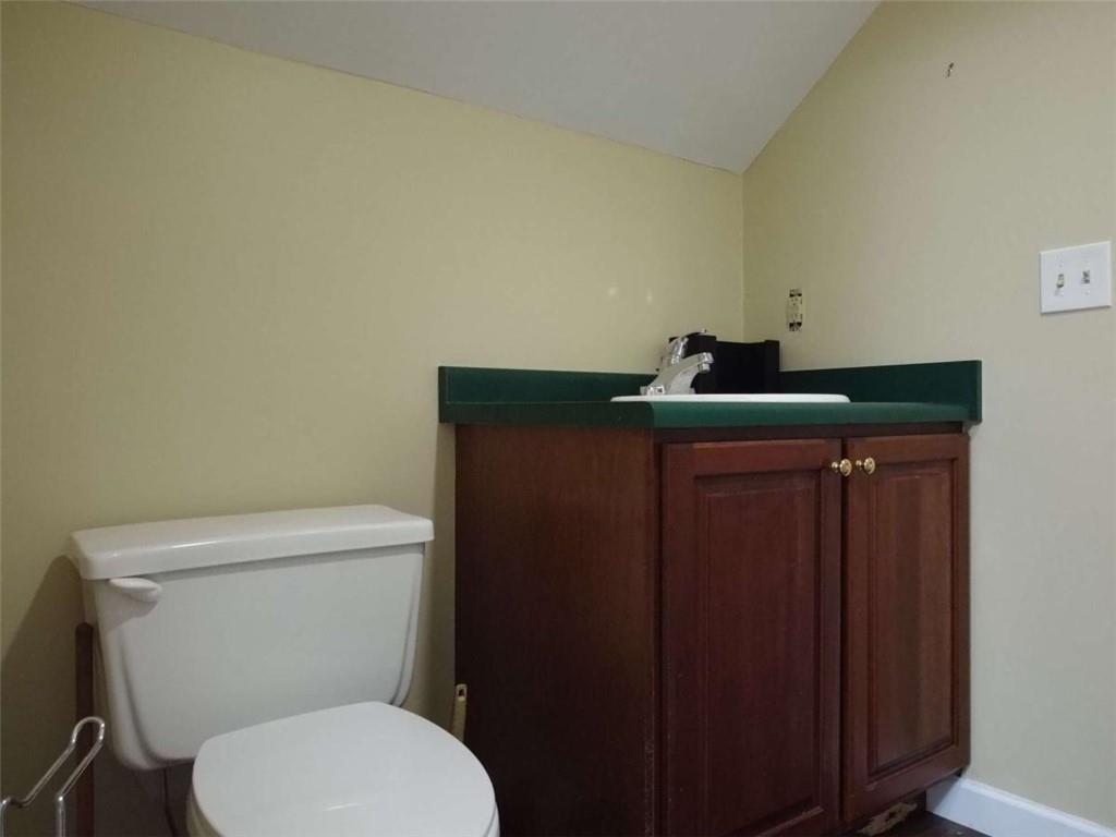 3218 Mill Street Northeast Covington, GA 30014 - Photo 36 of 69 a bathroom with a toilet and a sink