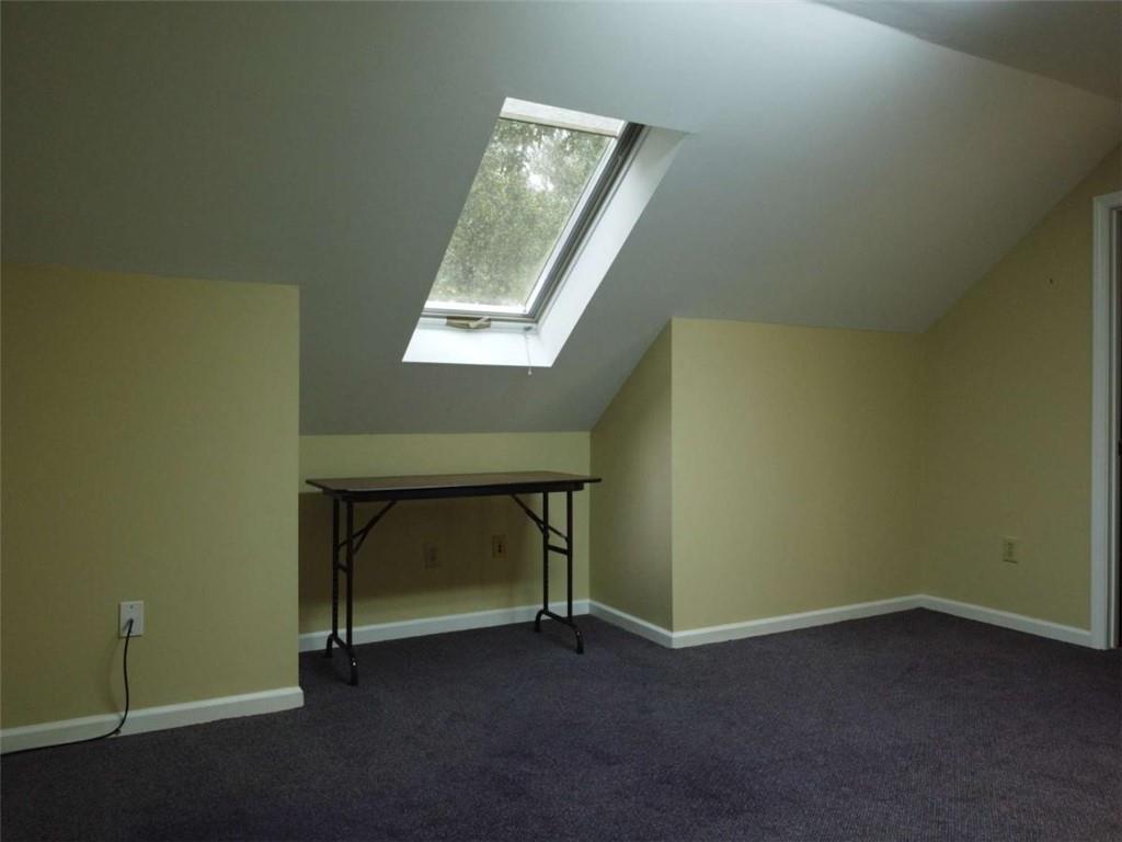 3218 Mill Street Northeast Covington, GA 30014 - Photo 38 of 69 a room with window and a table