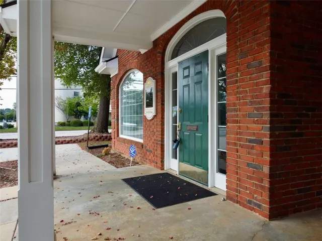 a view of a entryway door front of house