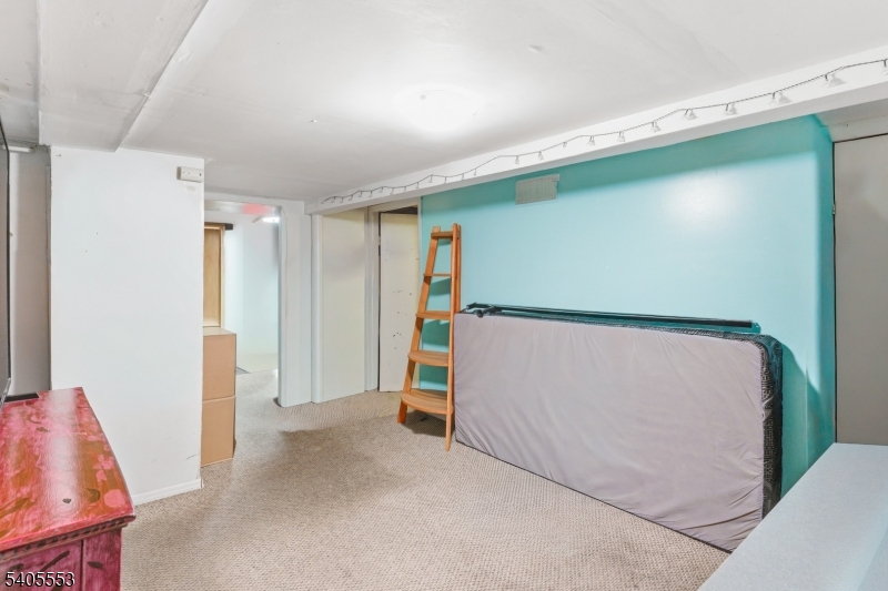 197 16th Avenue Paterson, NJ 07501 - Photo 18 of 23 a view of an empty room