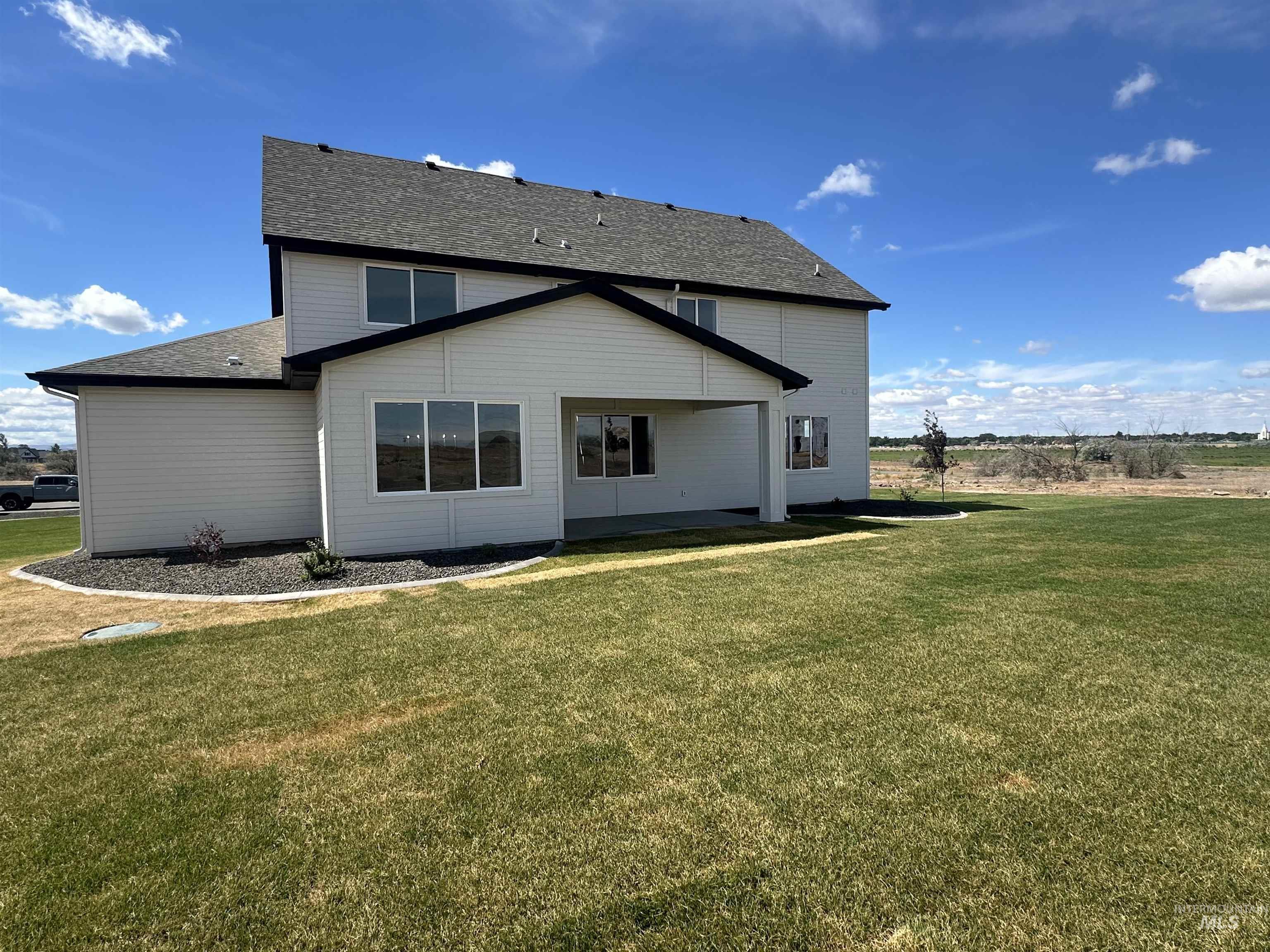 3035 Lake View Twin Falls, ID 83301 - Photo 38 of 41 Two-story residence featuring light-colored siding and a dark shingle roof