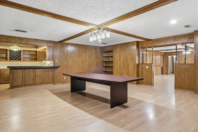 a lobby with furniture and window