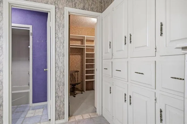 a bathroom with a toilet sink and bathtub