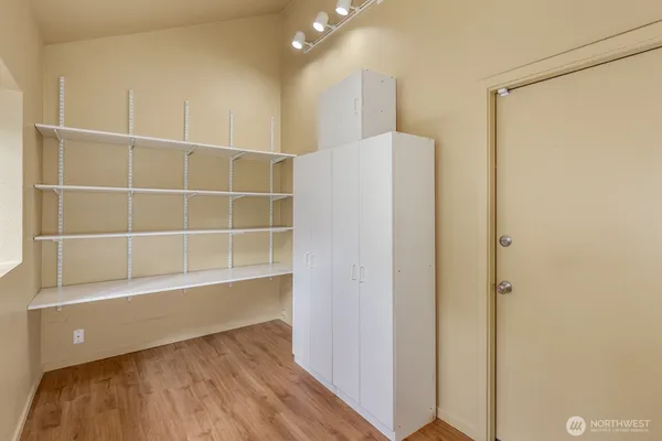 a view of an empty room with a window