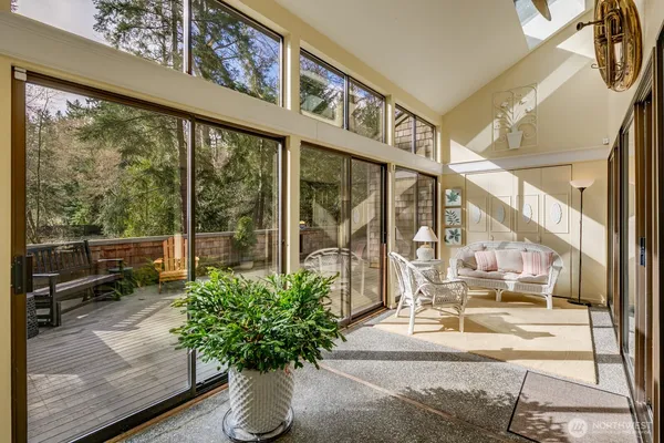 a living room with large windows
