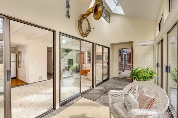 a view of an entryway with a livingroom