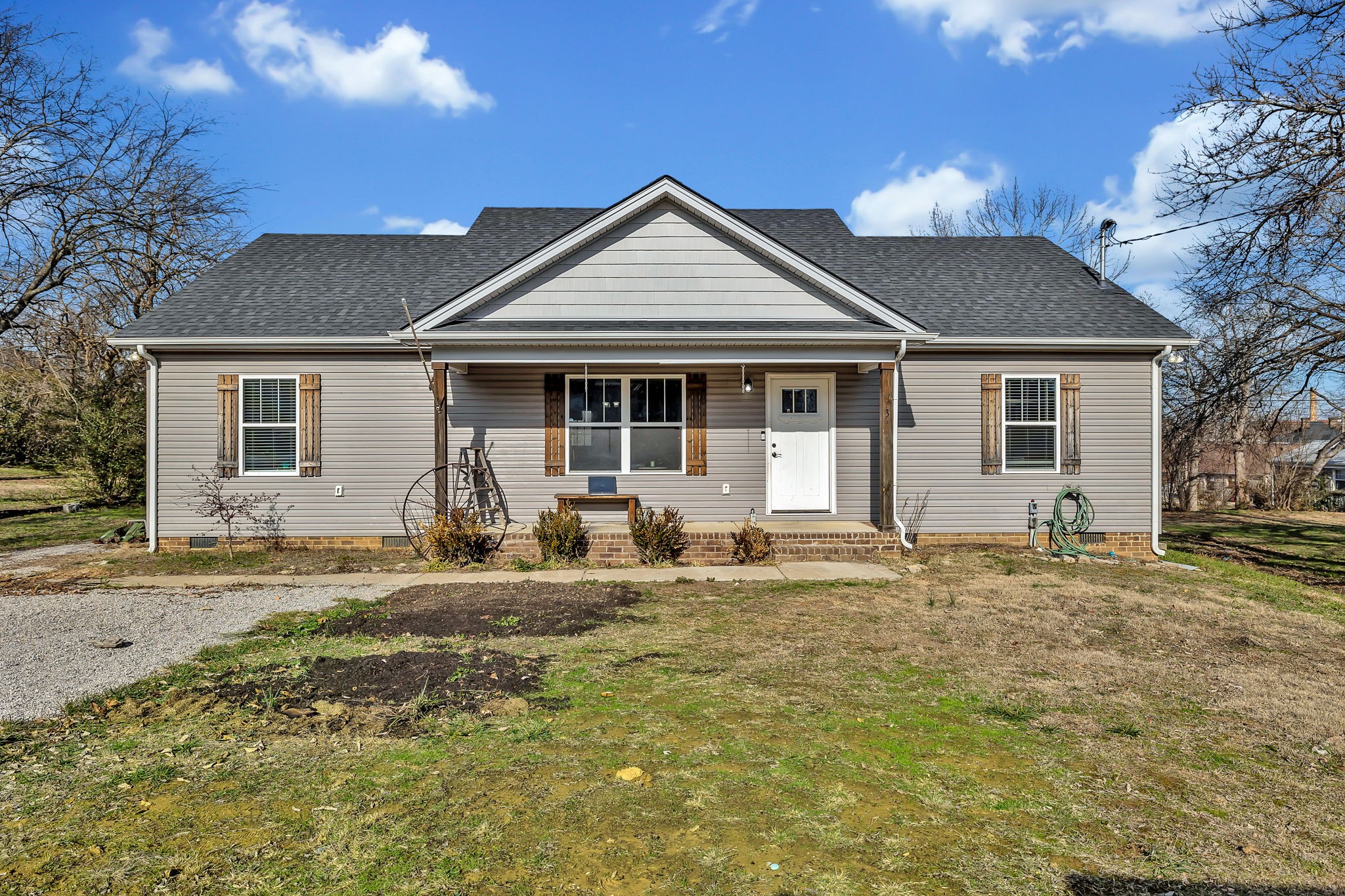 a front view of a house with yard