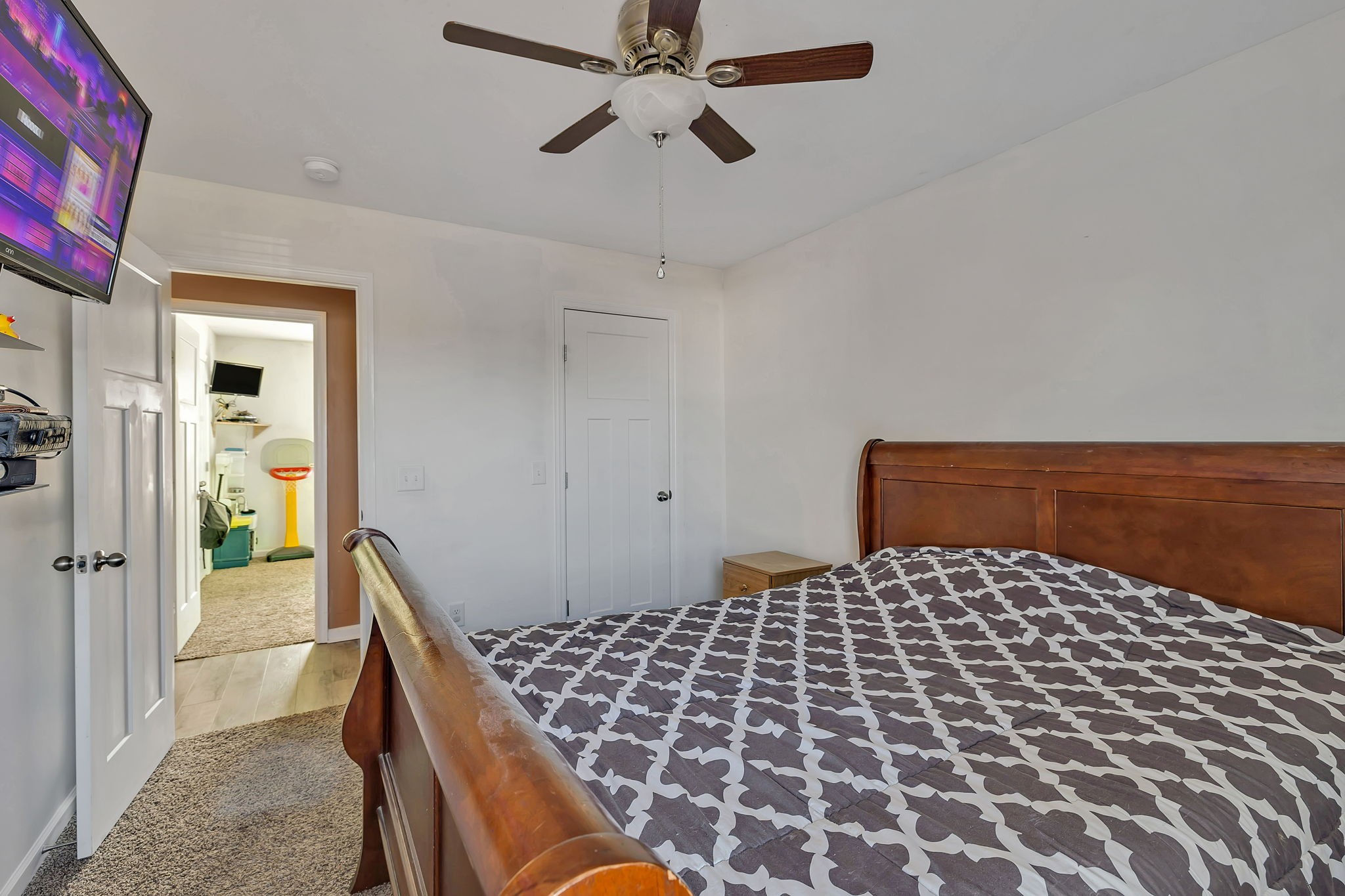 730 Cedar Street Lewisburg, TN 37091 - Photo 12 of 32 a bedroom with a bed and a chandelier