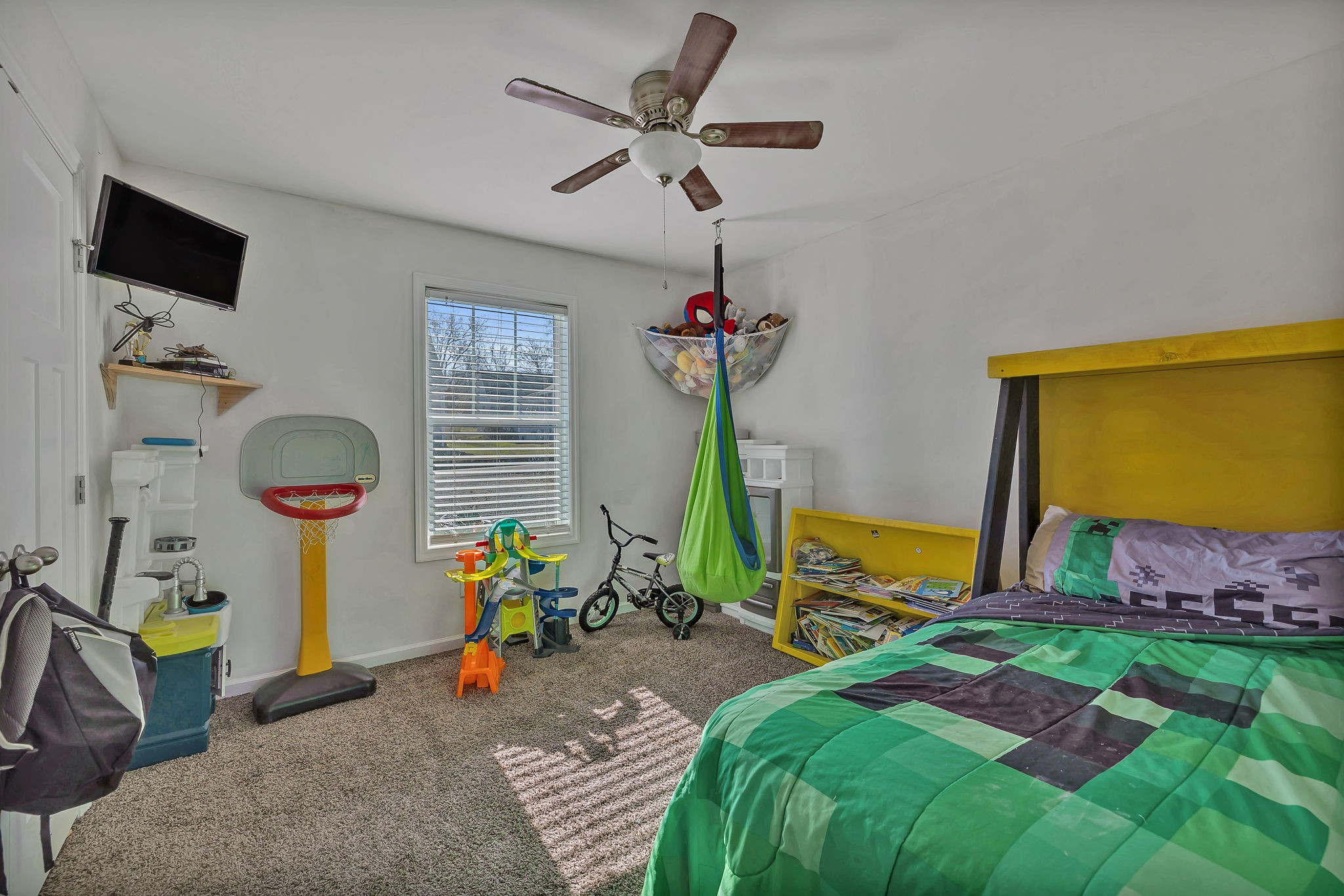 730 Cedar Street Lewisburg, TN 37091 - Photo 13 of 32 a bed room with a bed mirror and a window