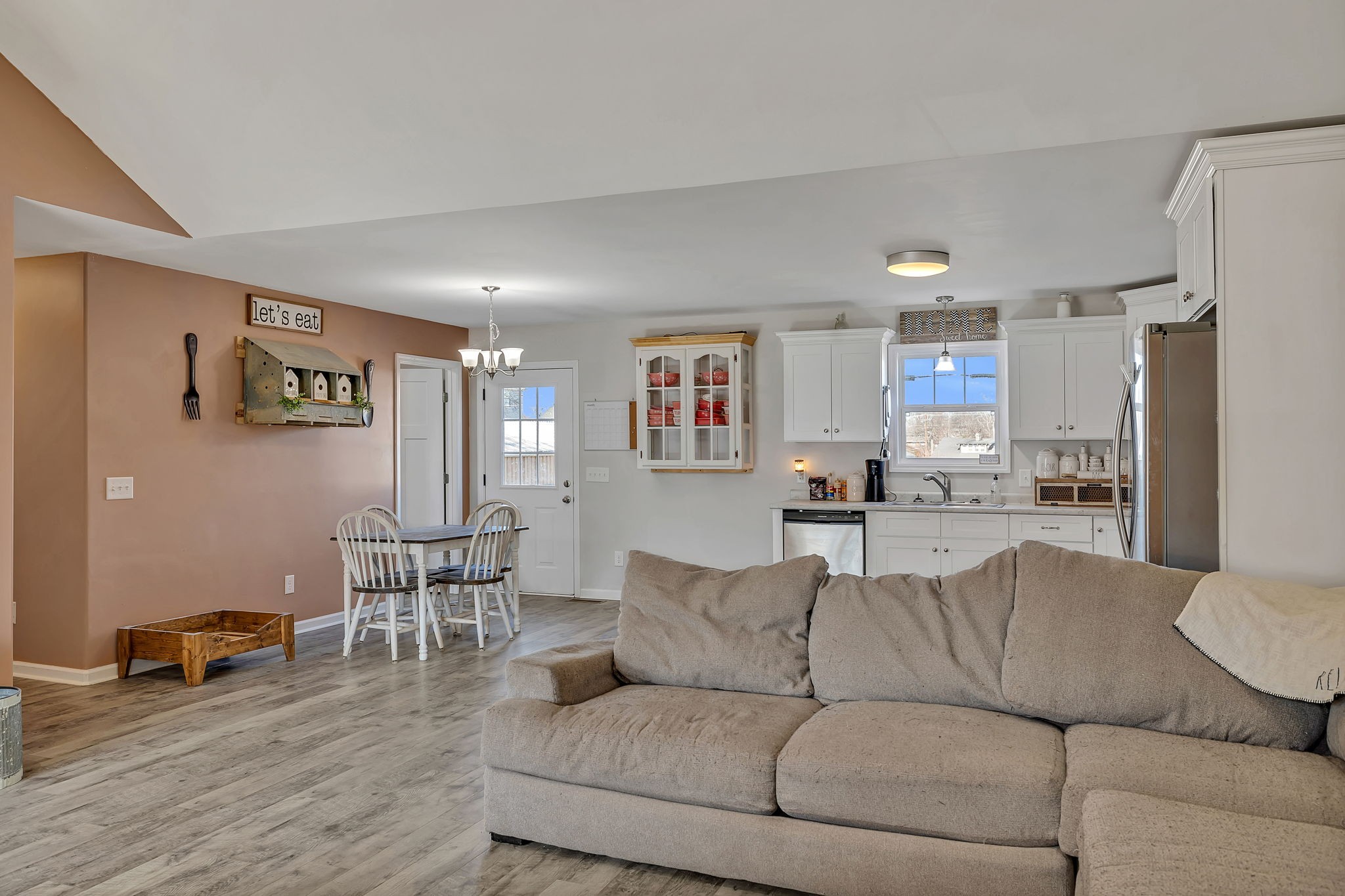 730 Cedar Street Lewisburg, TN 37091 - Photo 16 of 32 a living room with furniture and kitchen view with wooden floor