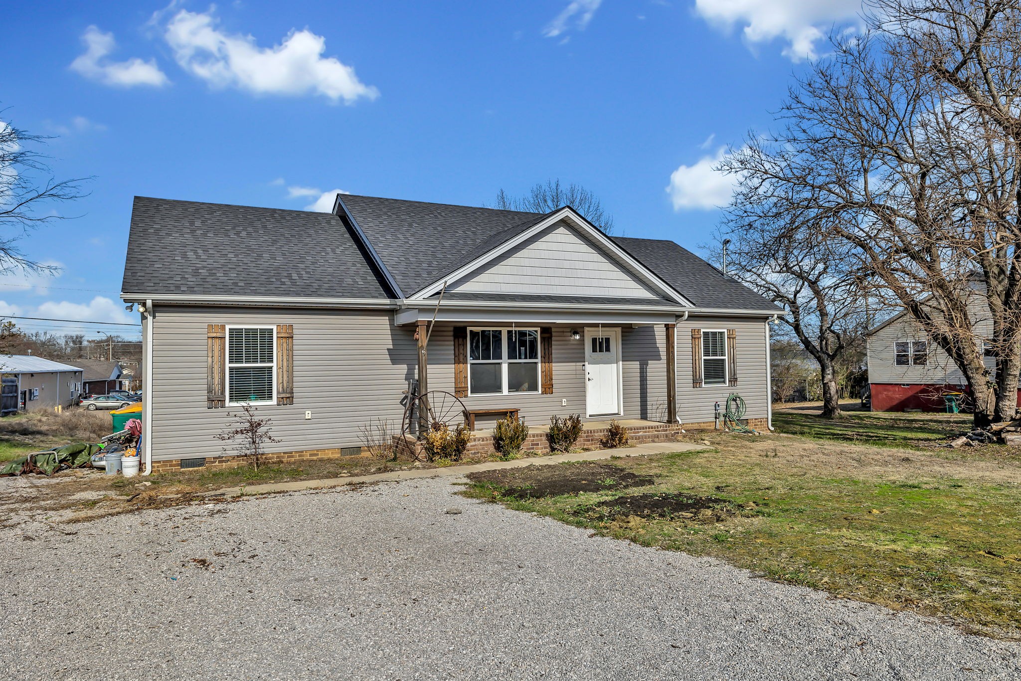 730 Cedar Street Lewisburg, TN 37091 - Photo 3 of 32 a front view of a house with a yard