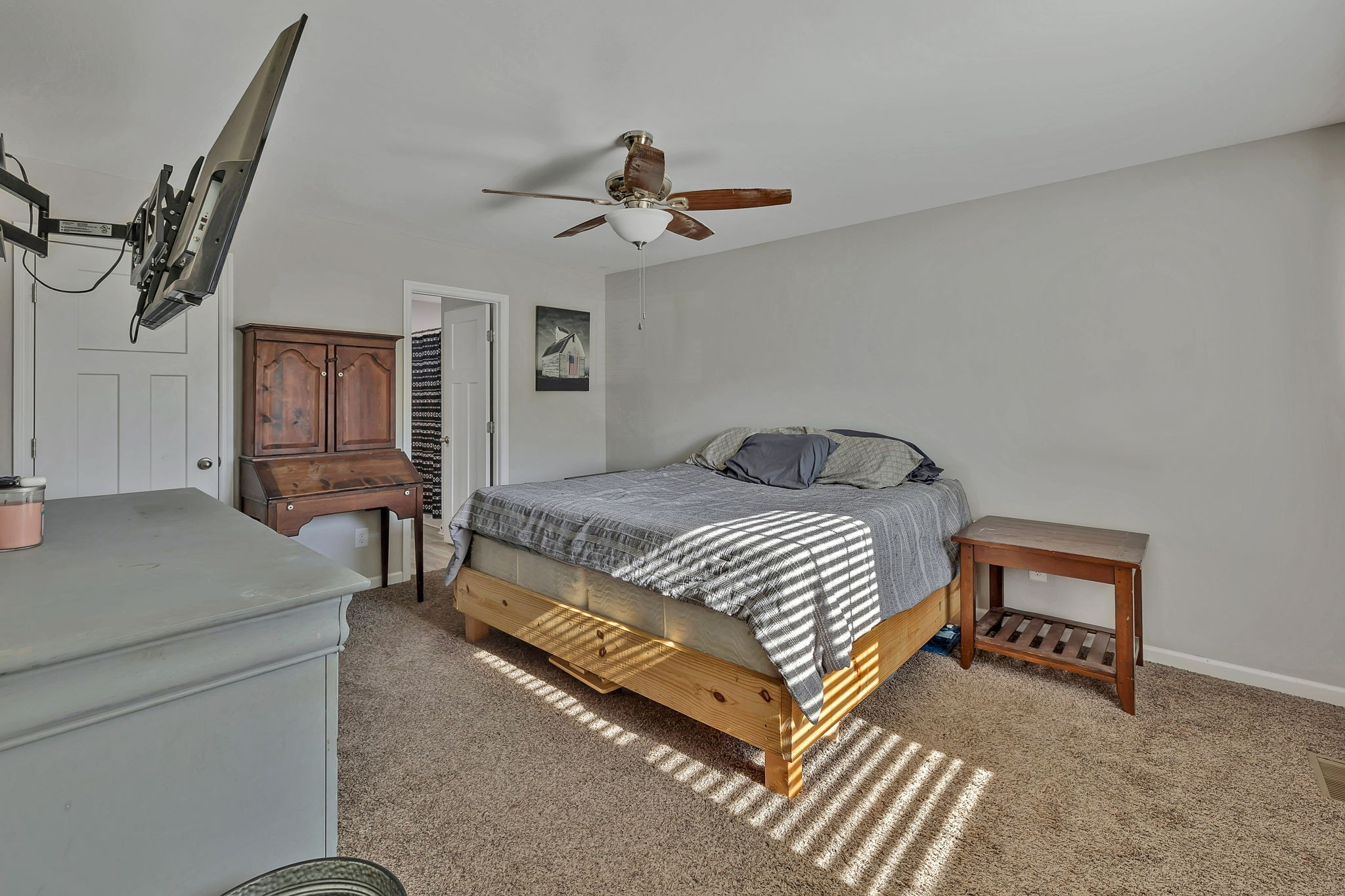 730 Cedar Street Lewisburg, TN 37091 - Photo 6 of 32 a bedroom with a bed and wooden floor