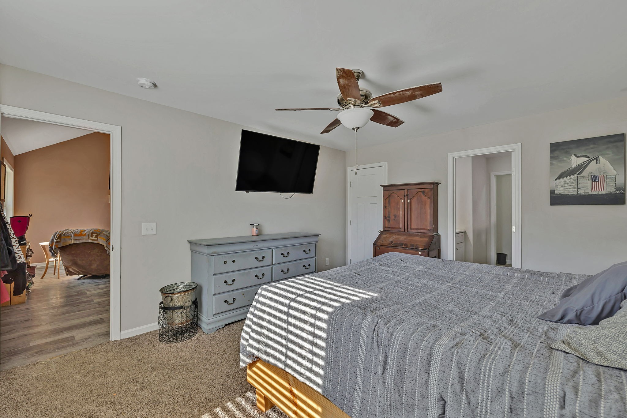 730 Cedar Street Lewisburg, TN 37091 - Photo 7 of 32 a bedroom with a bed and a flat screen tv