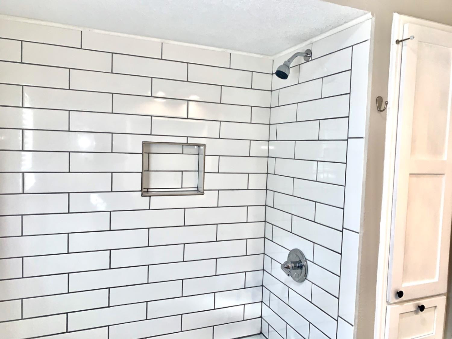 5708 91st Street Lubbock, TX 79424 - Photo 22 of 26 a bathroom with a shower