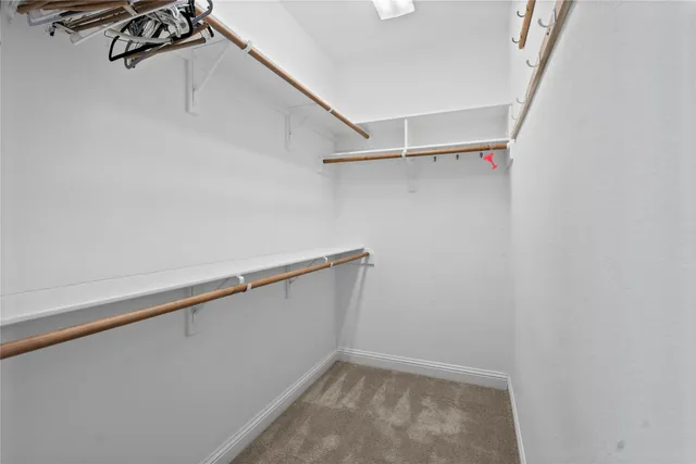 a room with cabinets and a window