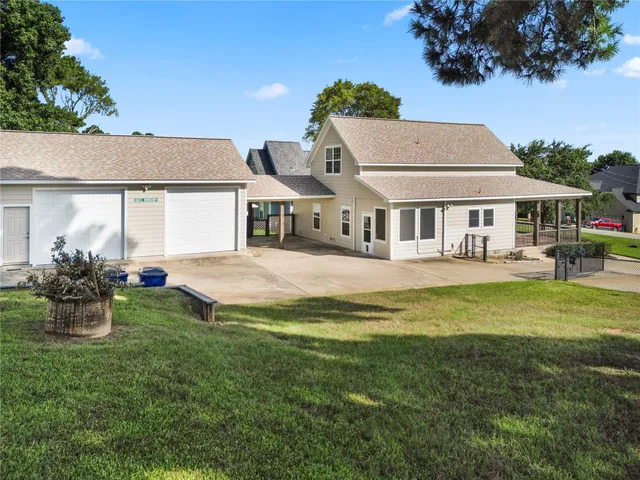 a front view of a house with yard
