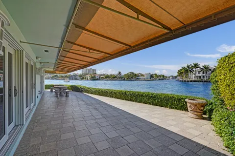 a view of swimming pool with a patio
