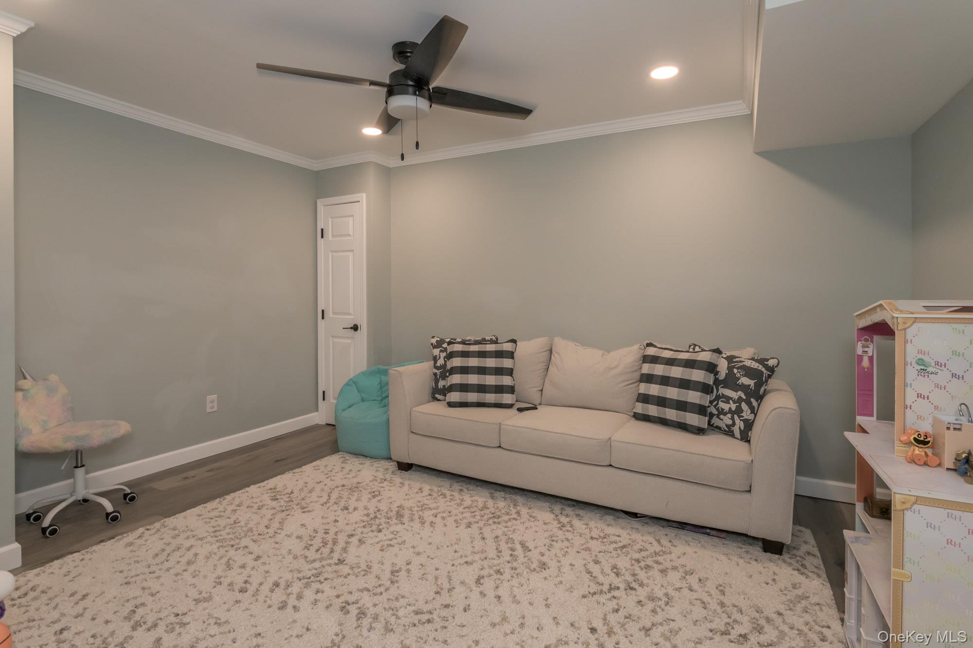 102 Beverly Road Chester, NY 10918 - Photo 42 of 49 a living room with furniture and a ceiling fan